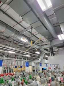 Industrial ceiling fan installed above a gas cylinder storage facility